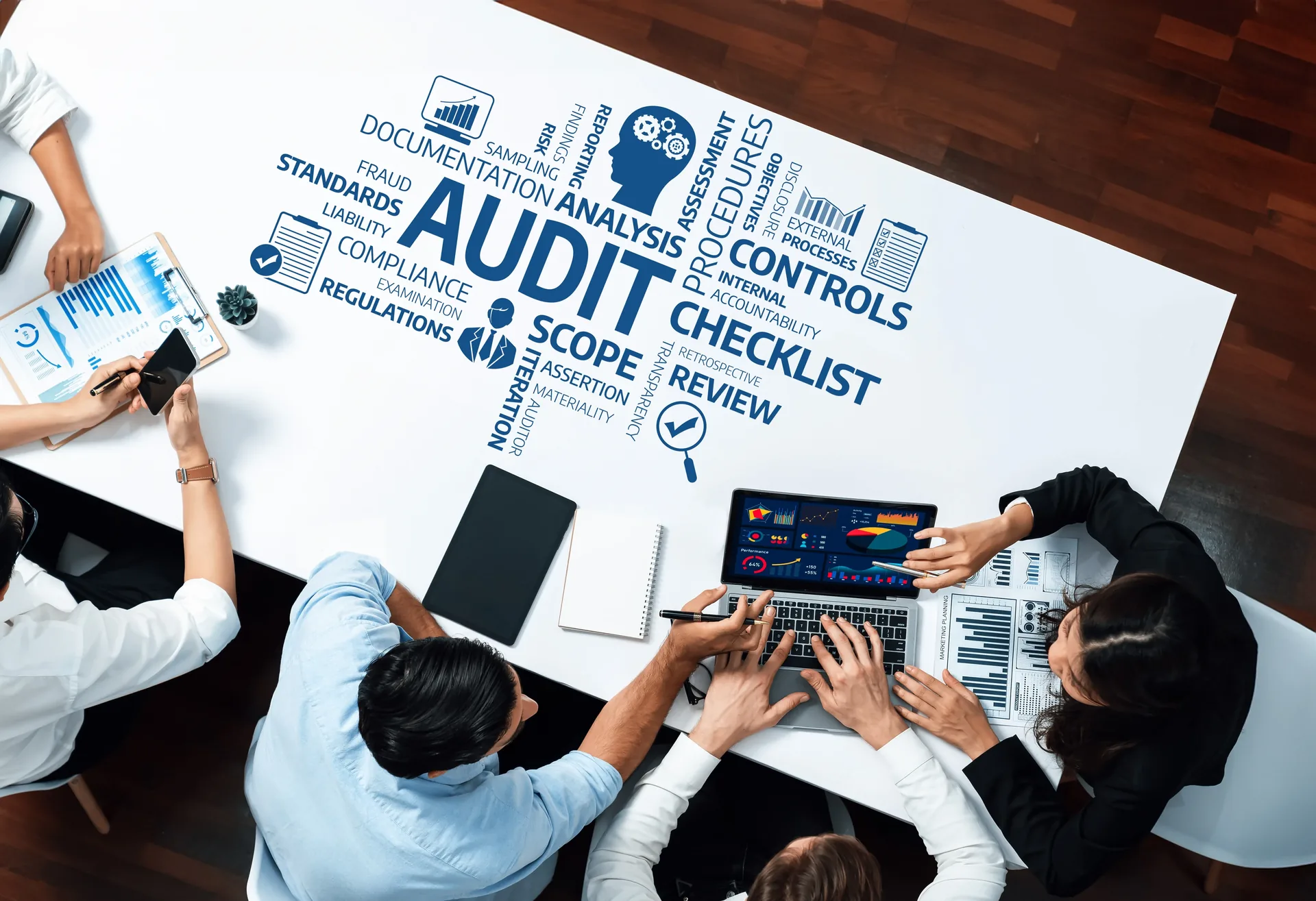 Audit team working around a table