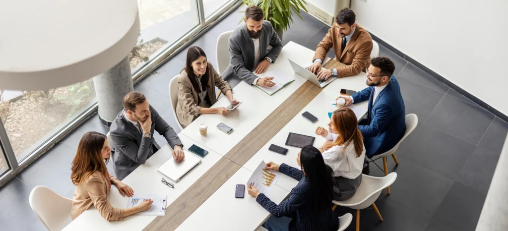 Professional team collaborating around a conference table